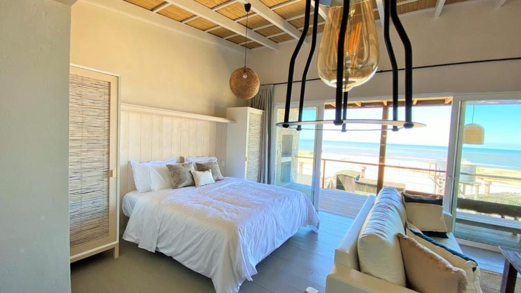 Ojos De La Viuda Apartment Punta Del Diablo Bagian luar foto